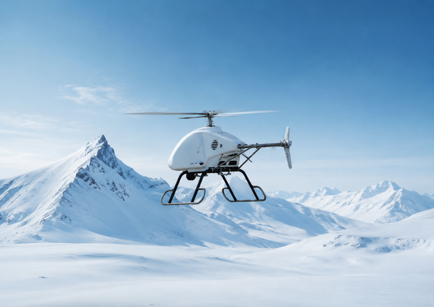 Aeolus UAV flying over snow-covered mountains